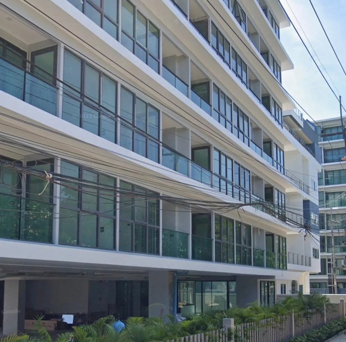 Facade of Breeze Beach Side with glass balconies
